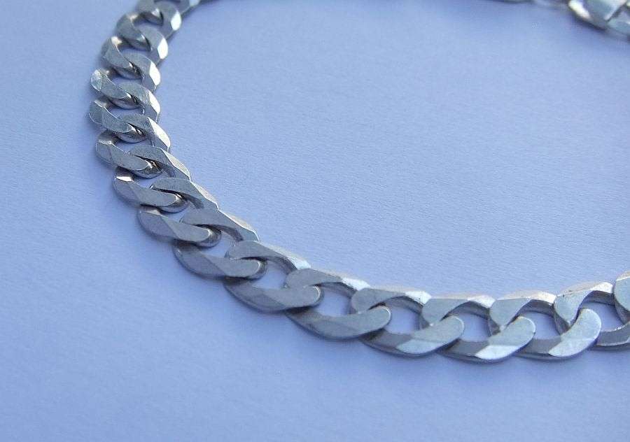 A SUPERIOR QUALITY WIDE WEIGHTY SOLID STERLING SILVER BRACELET WITH COOL CHAIN LINK SYSTEM !! WOW !!