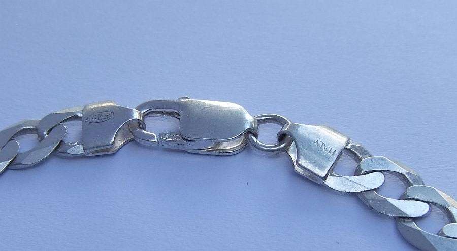 A SUPERIOR QUALITY WIDE WEIGHTY SOLID STERLING SILVER BRACELET WITH COOL CHAIN LINK SYSTEM !! WOW !!