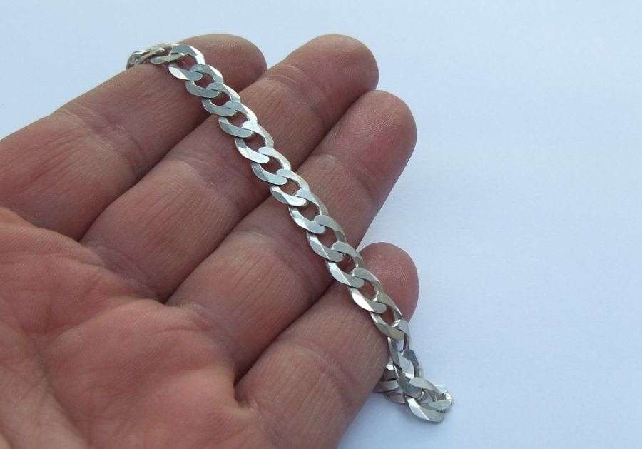 A SUPERIOR QUALITY WIDE WEIGHTY SOLID STERLING SILVER BRACELET WITH COOL CHAIN LINK SYSTEM !! WOW !!