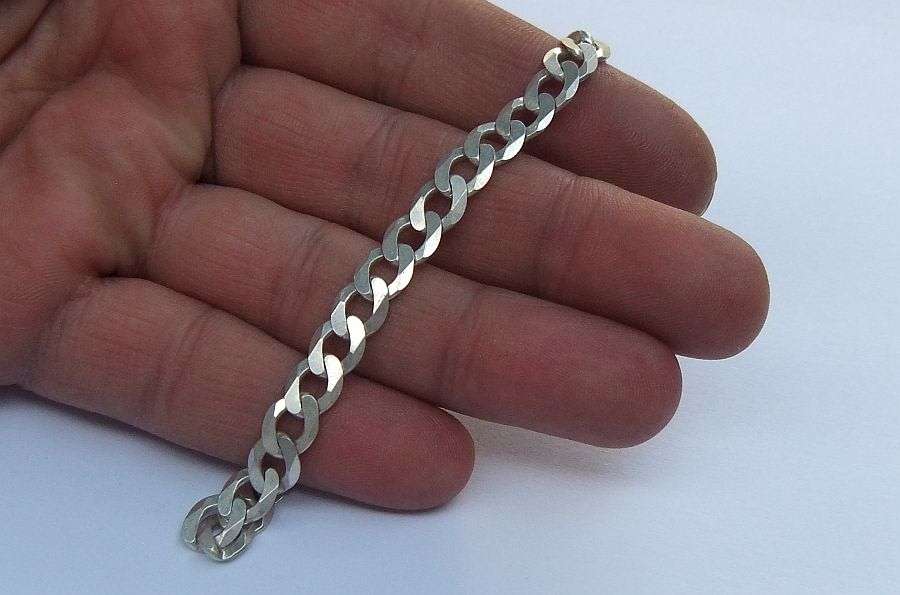 A SUPERIOR QUALITY WIDE WEIGHTY SOLID STERLING SILVER BRACELET WITH COOL CHAIN LINK SYSTEM !! WOW !!