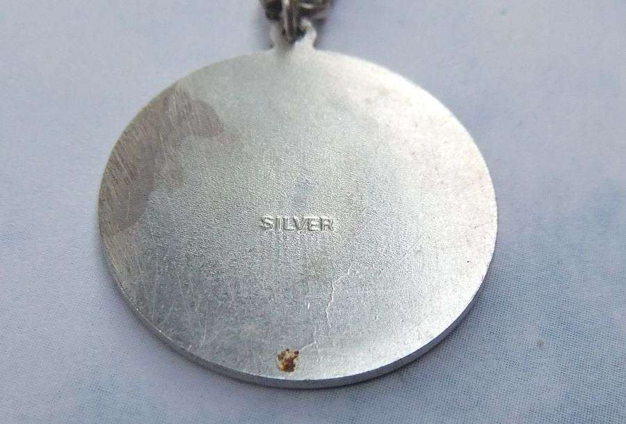 A BIGGER THAN USUAL DETAILED STERLING SILVER ST. CHRISTOPHER PENDANT AND HALLMARKED SILVER NECKLACE