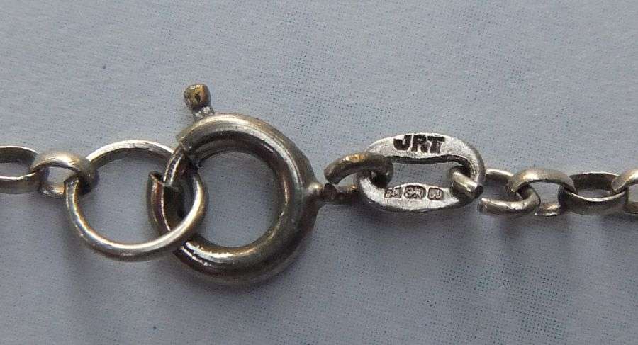 A BIGGER THAN USUAL DETAILED STERLING SILVER ST. CHRISTOPHER PENDANT AND HALLMARKED SILVER NECKLACE