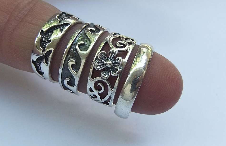 AS NEW !! FOUR SOLID STERLING SILVER TOE RINGS !! 4 DIFFERENT DESIGNS !! BID FOR ALL !! NEVER WORN !