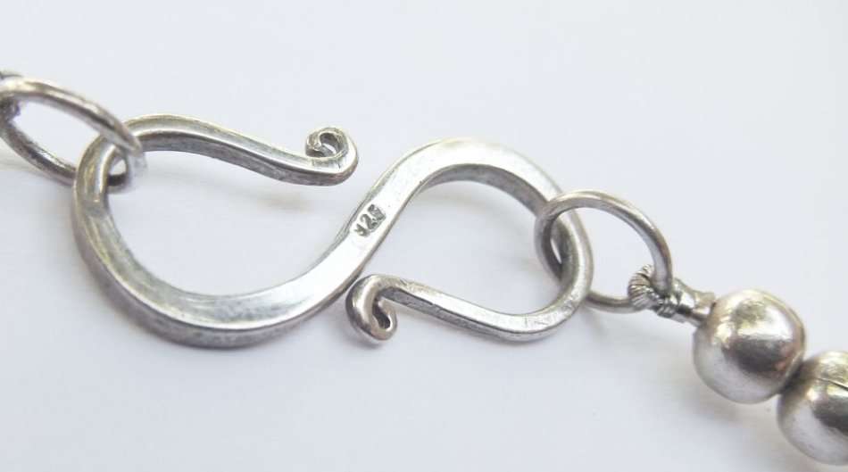 A HEAVY ARTISAN MADE BEAD NECKLACE WITH STERLING SILVER CLASP AND STERLING SILVER BEADS !! LOOK !!