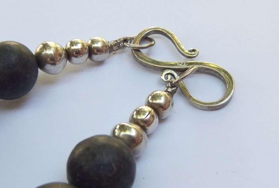 A HEAVY ARTISAN MADE BEAD NECKLACE WITH STERLING SILVER CLASP AND STERLING SILVER BEADS !! LOOK !!