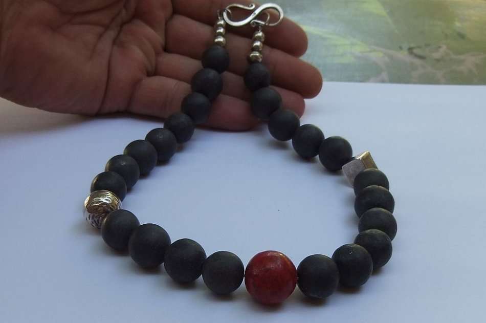 A HEAVY ARTISAN MADE BEAD NECKLACE WITH STERLING SILVER CLASP AND STERLING SILVER BEADS !! LOOK !!