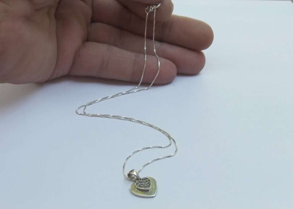A LOVELY FACETED CZ SET STERLING SILVER DOUBLE HEART PENDANT WITH A STERLING SILVER NECKLACE !!