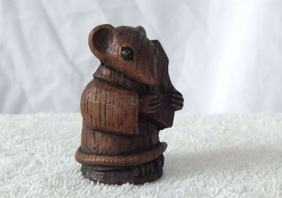 AN ADORABLE VINTAGE MOUSE WITH HARP ORNAMENT ..LOOKS LIKE CARVED WOOD BUT HEAVY LIKE RESIN ...NICE