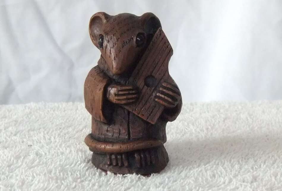 AN ADORABLE VINTAGE MOUSE WITH HARP ORNAMENT ..LOOKS LIKE CARVED WOOD BUT HEAVY LIKE RESIN ...NICE