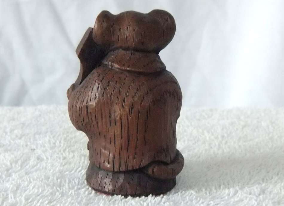 AN ADORABLE VINTAGE MOUSE WITH HARP ORNAMENT ..LOOKS LIKE CARVED WOOD BUT HEAVY LIKE RESIN ...NICE