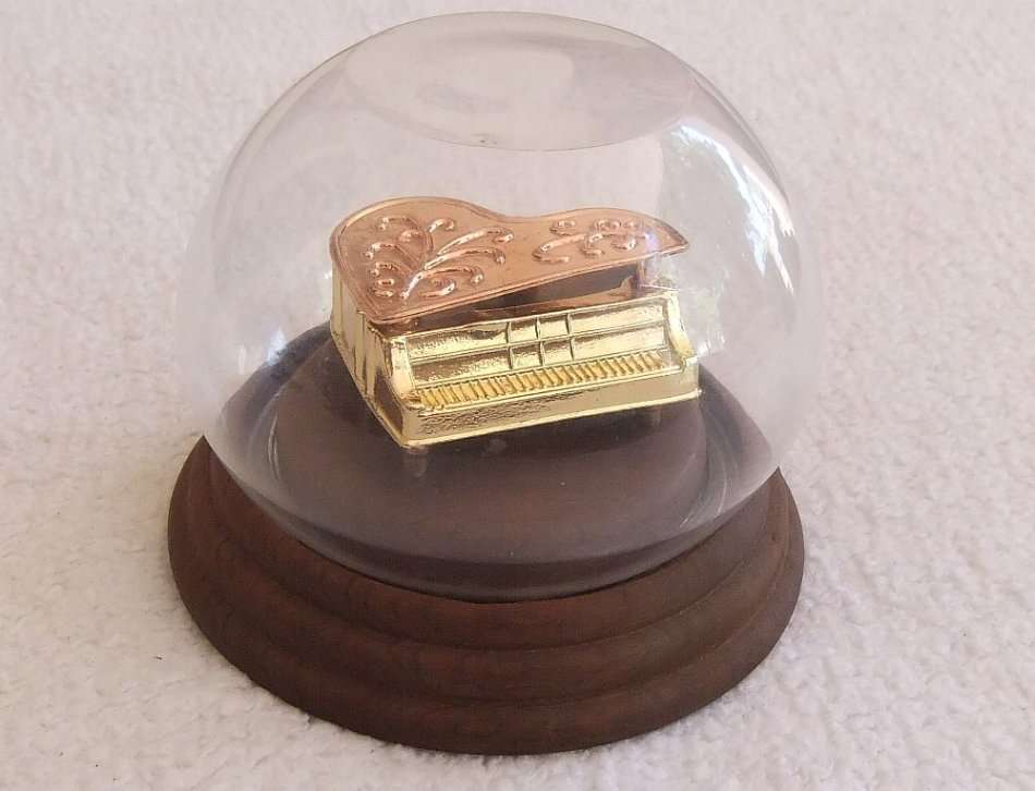 A CLASSY VINTAGE HEAVY METAL MODEL OF A GRAND PIANO ON A WOODEN BASE WITH PROTECTIVE DOME !! SWEET !