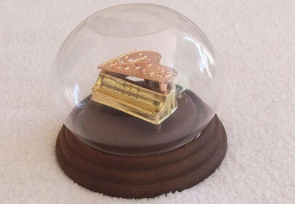 A CLASSY VINTAGE HEAVY METAL MODEL OF A GRAND PIANO ON A WOODEN BASE WITH PROTECTIVE DOME !! SWEET !