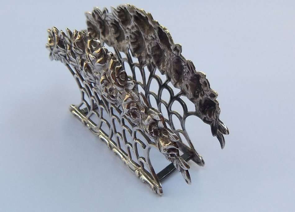 RARE FIND !! AN OLD SOLID 80% SILVER SERVIETTE OR LETTER HOLDER WITH INTRICATE ROSE DETAIL !!