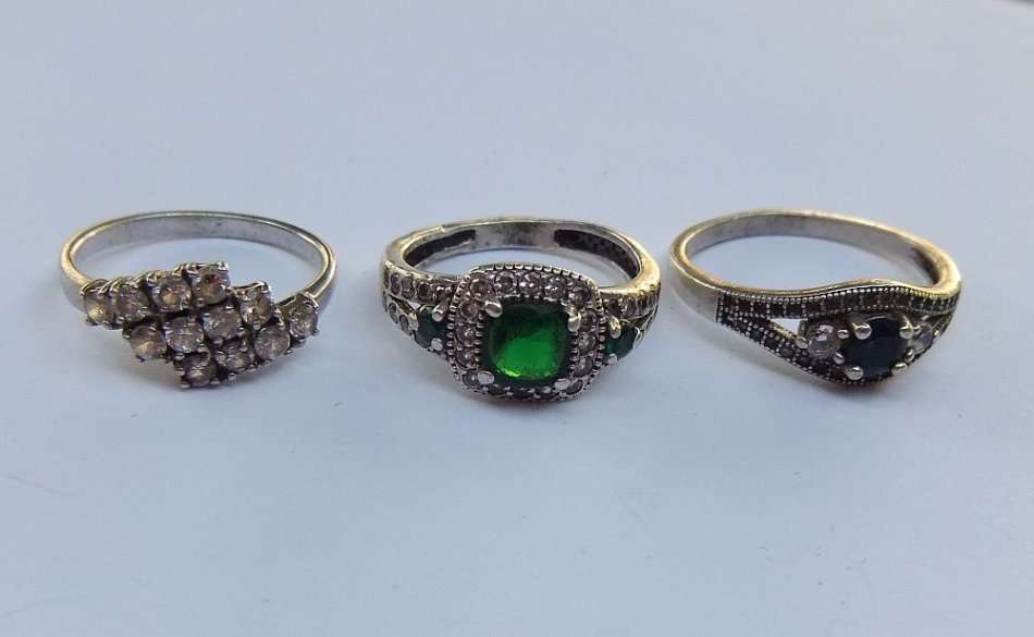 BLING BLING !! A STUNNING LOT OF THREE SOLID STERLING SILVER RINGS SET WITH LOTS OF FACETED STONES