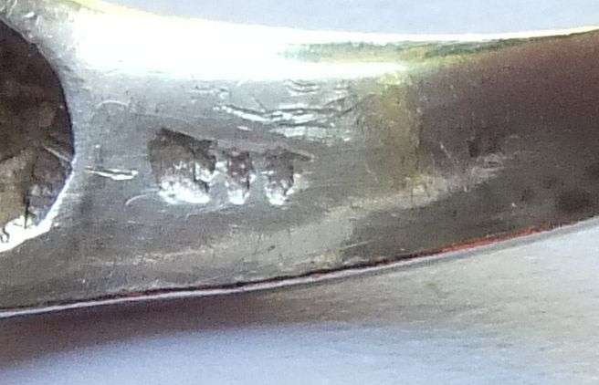 A GORGEOUS SOLID STERLING SILVER RING WITH INTRICATE DETAIL AND A FACETED RED STONE !! WOW !!