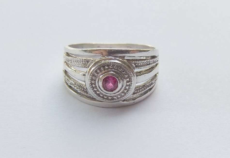 WOW !! A MAGNIFICENT WIDE SOLID STERLING SILVER RING SET WITH A RUBY RED FACETED STONE !!