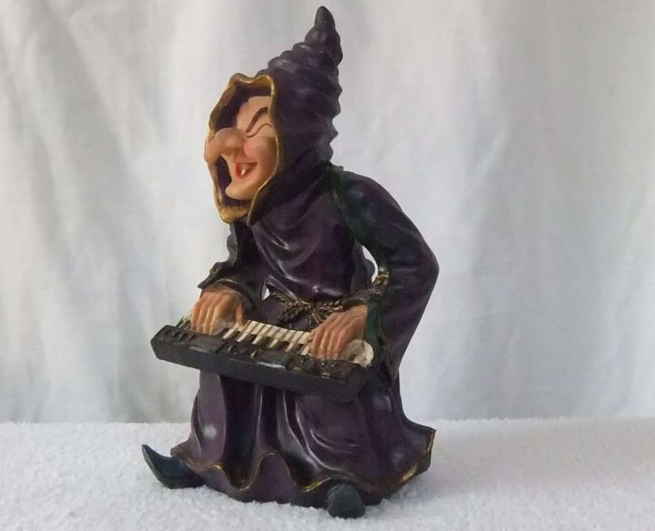 WHAT HAVE WE HERE !! A LARGE HAND PAINTED FIGURE OF A KEYBOARD PLAYING ONE TOOTHED WITCH !!