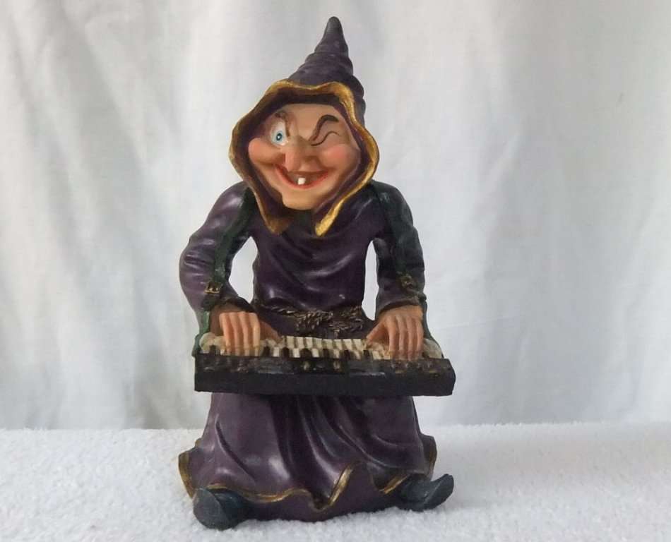 WHAT HAVE WE HERE !! A LARGE HAND PAINTED FIGURE OF A KEYBOARD PLAYING ONE TOOTHED WITCH !!