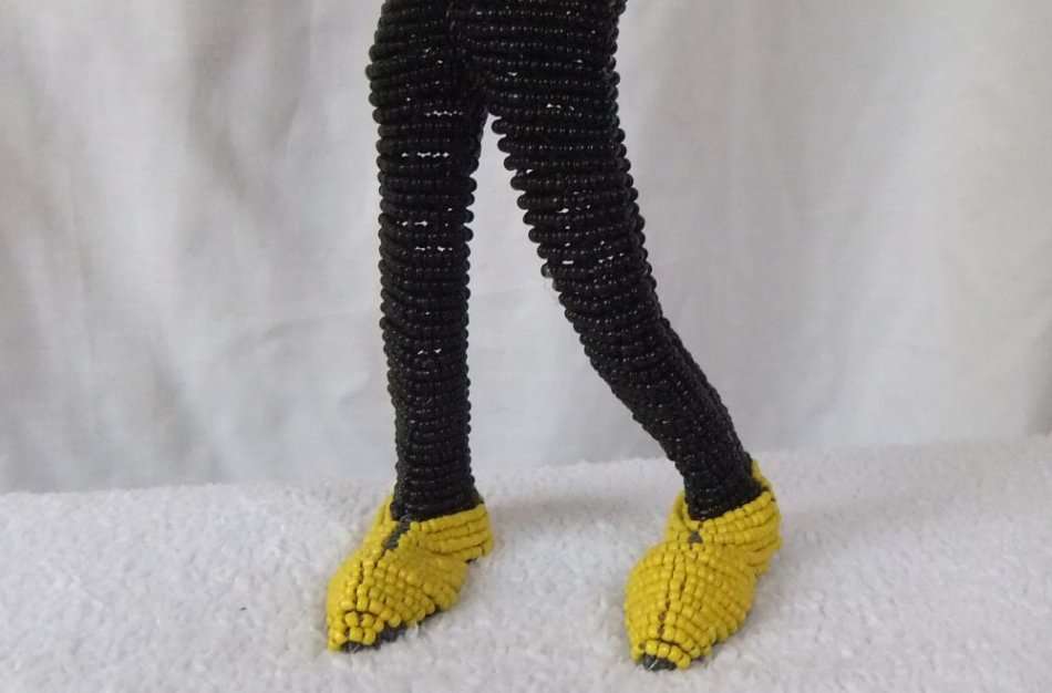 A TALL VINTAGE HAND MADE INTRICATELY DETAILED MUSICIAN FIGURE MADE OF WIRE AND HUNDREDS OF BEADS !!