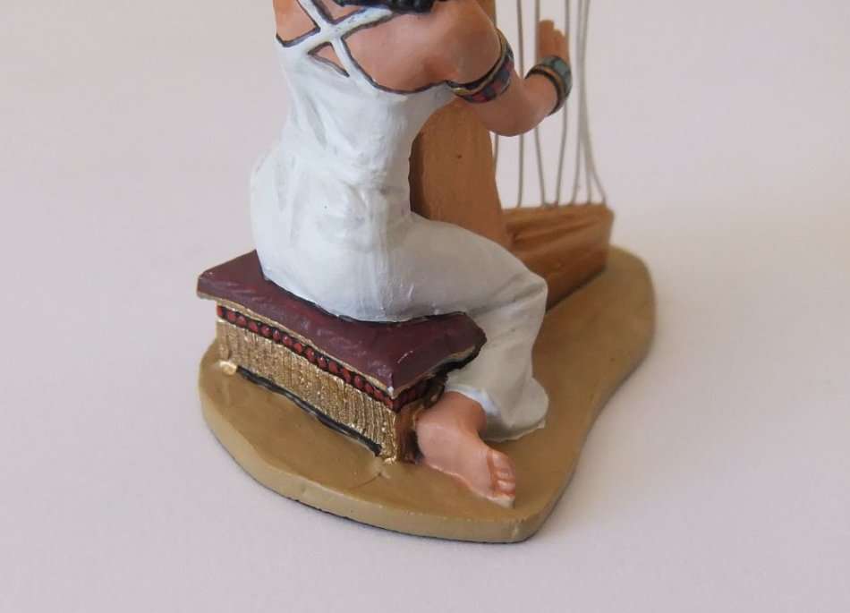 A GORGEOUS HAND PAINTED SOLID LEAD MODEL OF AN EGYPTIAN GODDESS PLAYING THE HARP BY KING & COUNTRY`S