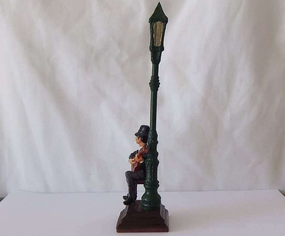 FROM ARGENTINA !! A VINTAGE HAND PAINTED RESIN FIGURE OF A GUITARIST RESTING AT A LAMP POST !! SWEET