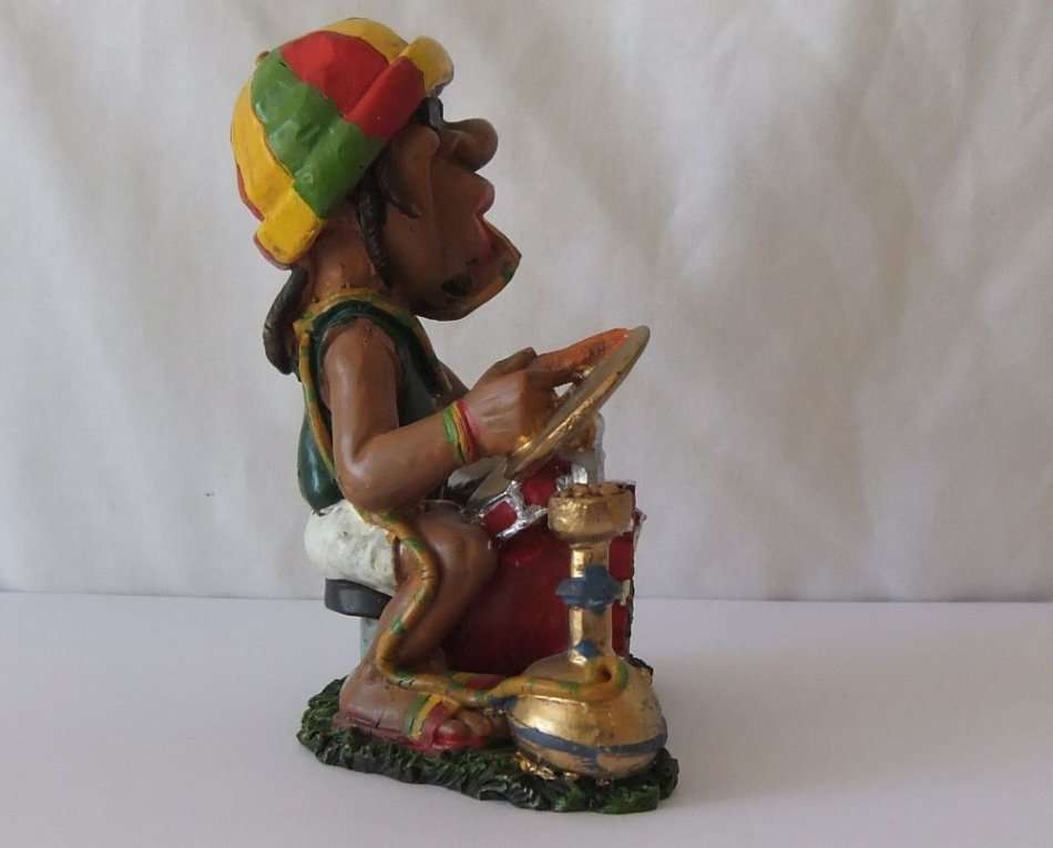 LEGALIZE IT,YE,YE, DONT CRITISIZE IT..A DOPE VINTAGE SOLID RESIN COMPOSITE FIGURE OF A RASTA DRUMMER