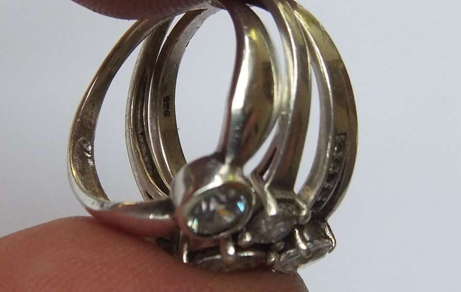 THREE ABSOLUTELY GORGEOUS SOLID STERLING SILVER RINGS SET WITH CUBIC ZIRCONIAS !! BID FOR THE LOT !!
