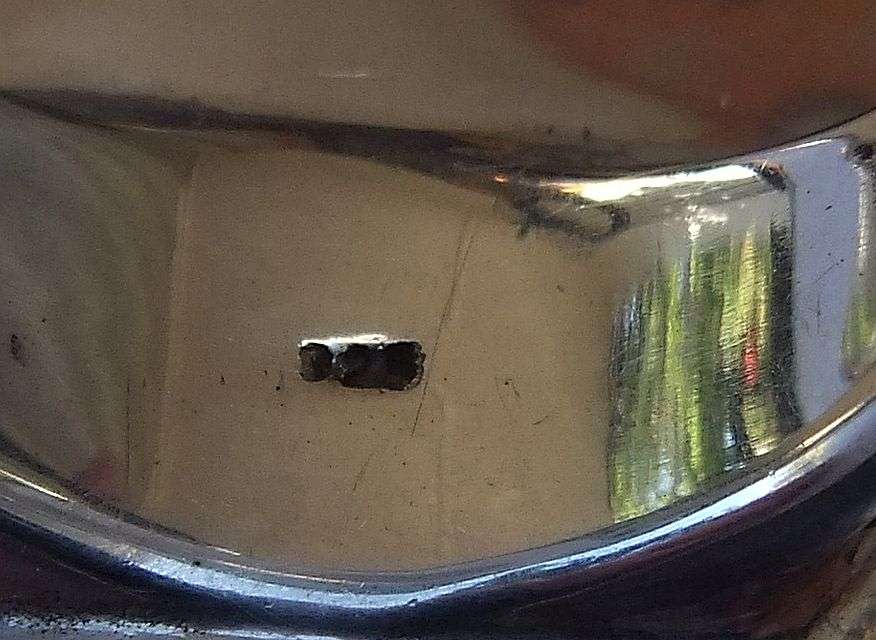 A STERLING SILVER LARGE ROSE FORM RING - STAMPED AND TESTED