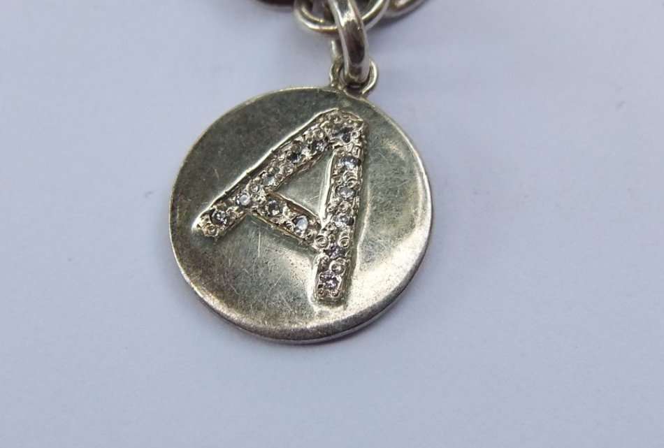 A TOP QUALITY STERLING SILVER BRACELET WITH LETTER ""A"" INITIAL DISC - STAMPED AND TESTED