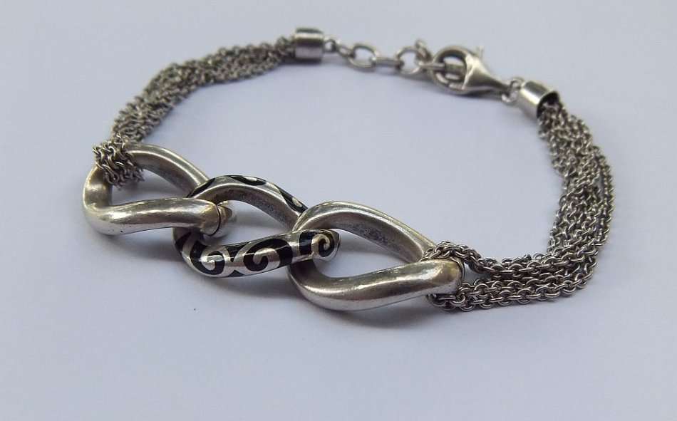 A SUPERIOR QUALITY DESIGNER MULTI STRAND BRACELET BY ESPRIT - STAMPED AND TESTED - HIGH VALUE