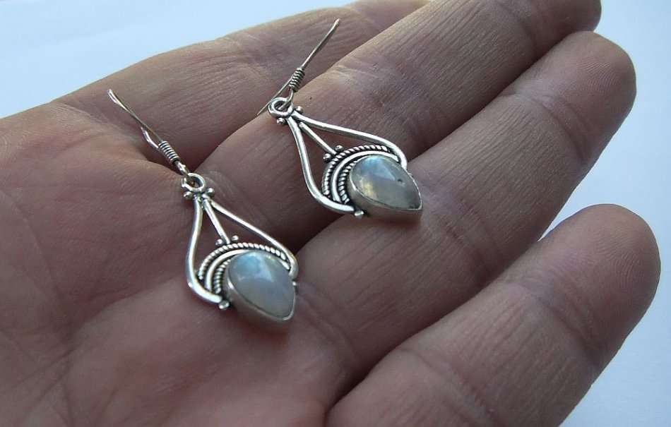 A VINTAGE STYLE SOLID STERLING SILVER PAIR OF EARRINGS SET WITH CABOCHON MOONSTONES - FULLY TESTED