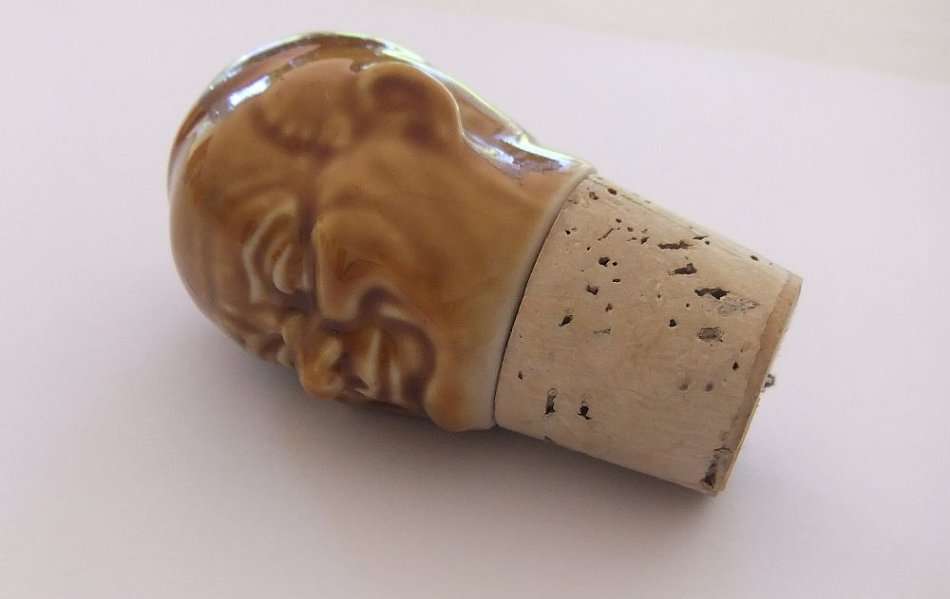 A VINTAGE MONK MOTIF BOTTLE CORK STOPPER