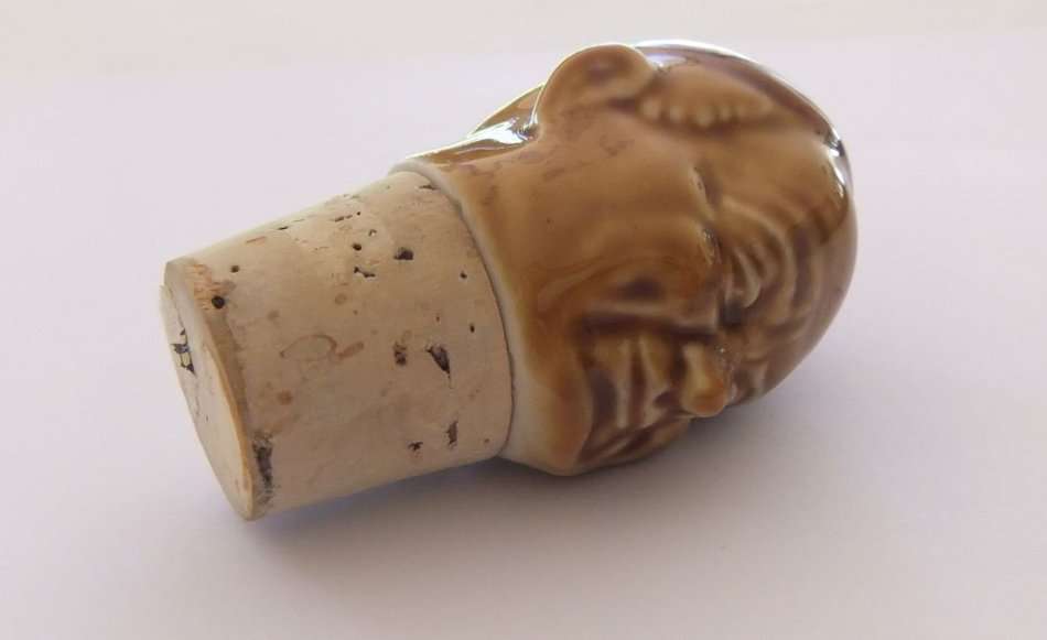 A VINTAGE MONK MOTIF BOTTLE CORK STOPPER
