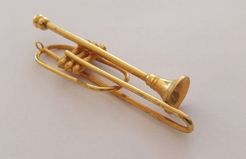 A SOLID METAL MODEL OF A TROMBONE