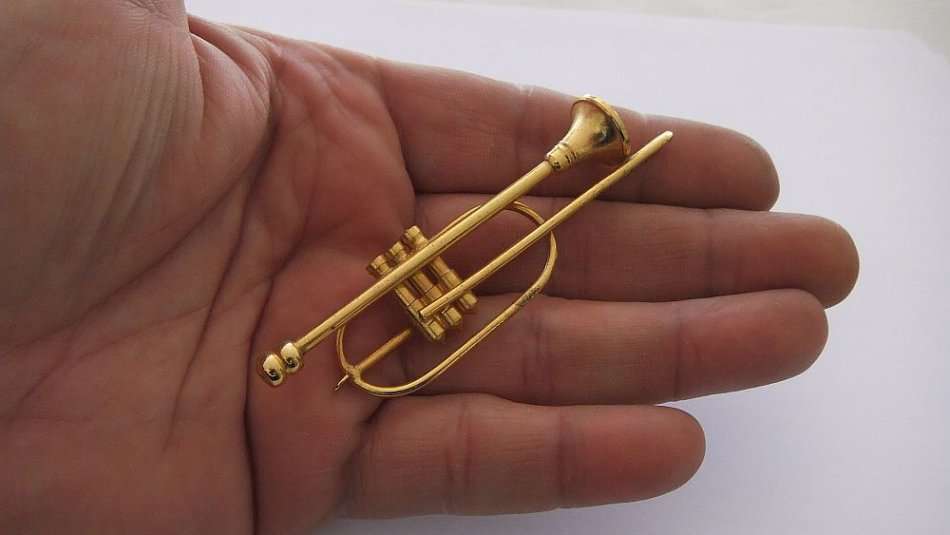 A SOLID METAL MODEL OF A TROMBONE