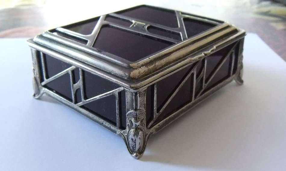 A BEAUTIFUL ART DECO PERIOD METAL AND GLASS JEWELRY BOX