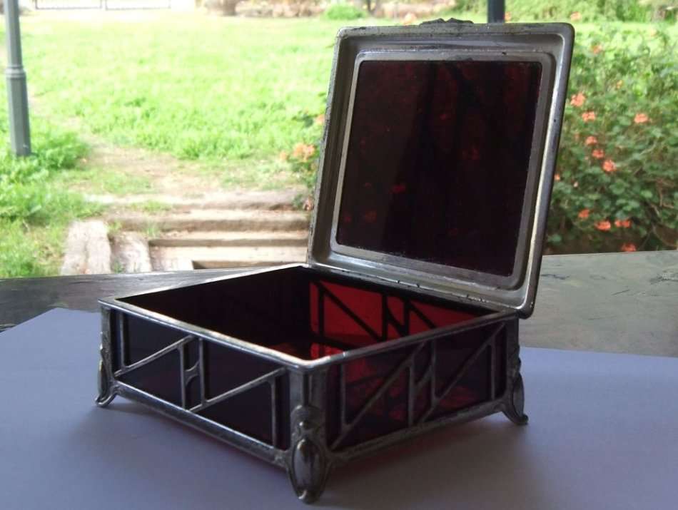 A BEAUTIFUL ART DECO PERIOD METAL AND GLASS JEWELRY BOX