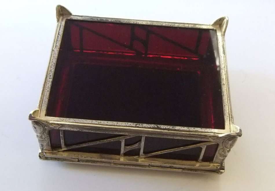 A BEAUTIFUL ART DECO PERIOD METAL AND GLASS JEWELRY BOX