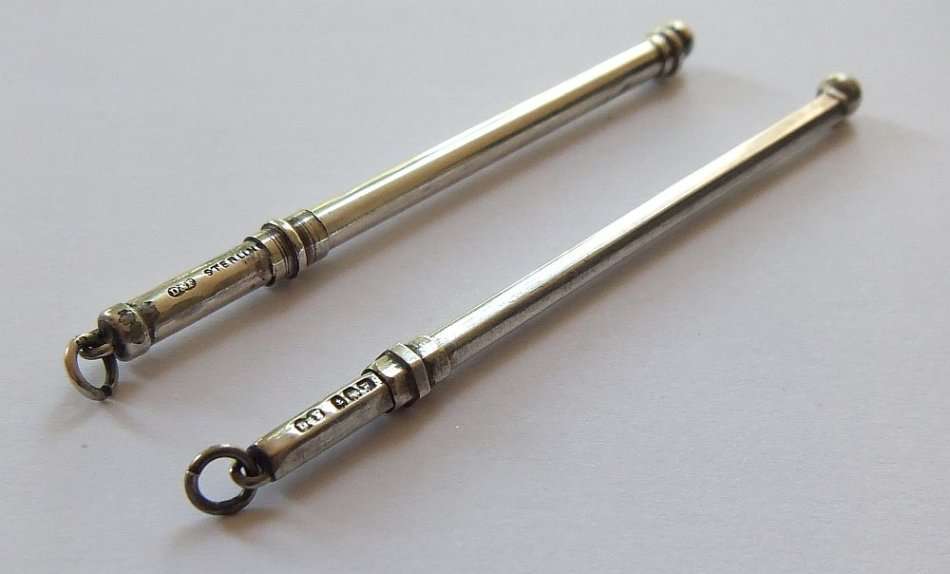 TWO VINTAGE HALLMARKED STERLING SILVER SWIZZLE STICKS BY DEAKIN & FRANCIS OF BIRMINGHAM