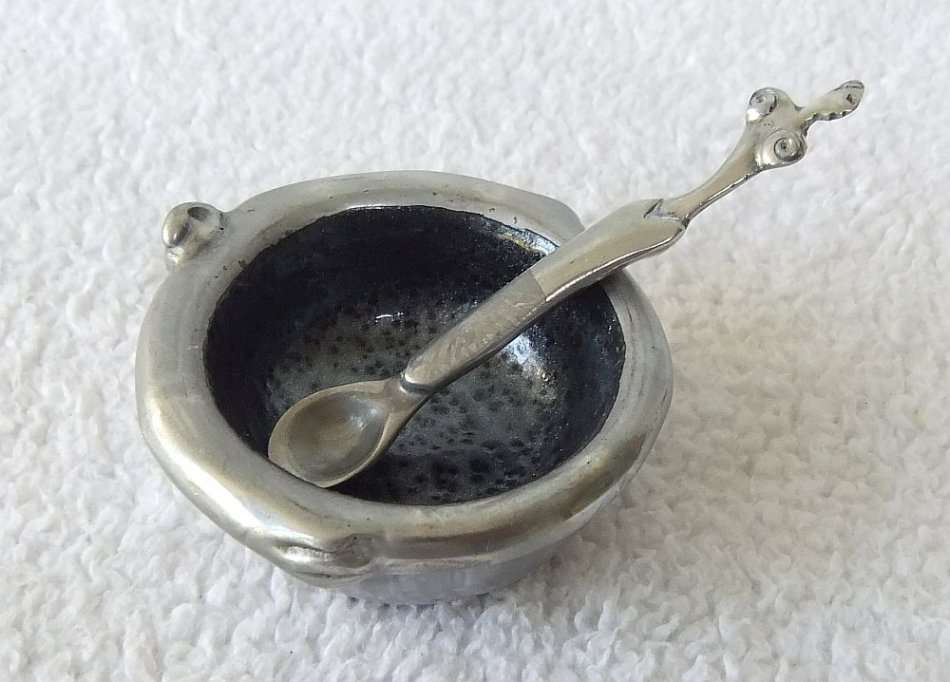 A GENUINE CARROL BOYES OPEN SALT AND SPOON - MAN & WOMAN MOTIF