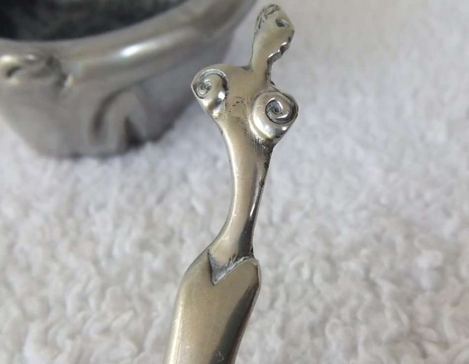 A GENUINE CARROL BOYES OPEN SALT AND SPOON - MAN & WOMAN MOTIF