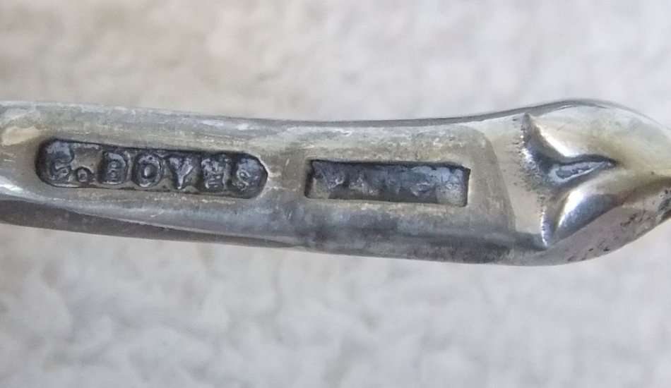 A GENUINE CARROL BOYES OPEN SALT AND SPOON - MAN & WOMAN MOTIF