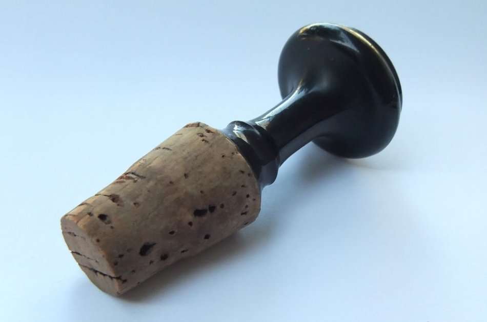 A RARE VINTAGE "CAPE ORGAN BUILDERS" ADVERTISING CORK STOP