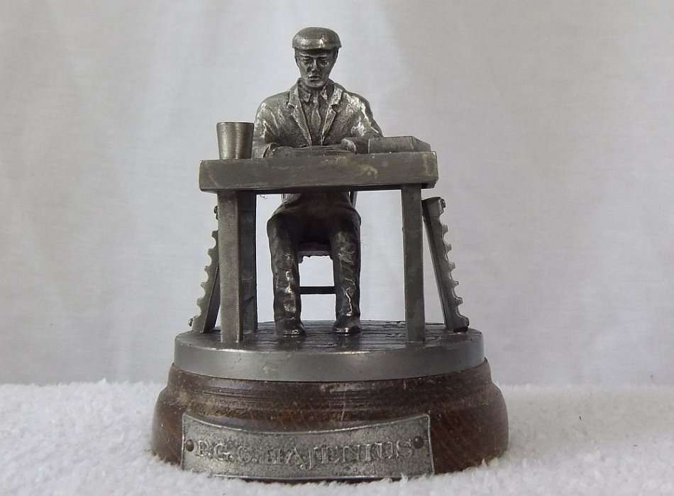 MADE FOR P.G.C HAJENIUS CIGARS OF AMSTERDAM !! A PEWTER STATUE OF A CIGAR ROLLER !! STAMPED !! WOW !