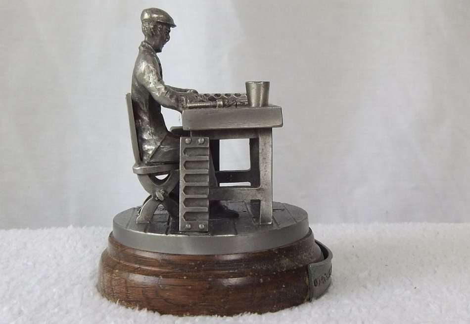 MADE FOR P.G.C HAJENIUS CIGARS OF AMSTERDAM !! A PEWTER STATUE OF A CIGAR ROLLER !! STAMPED !! WOW !