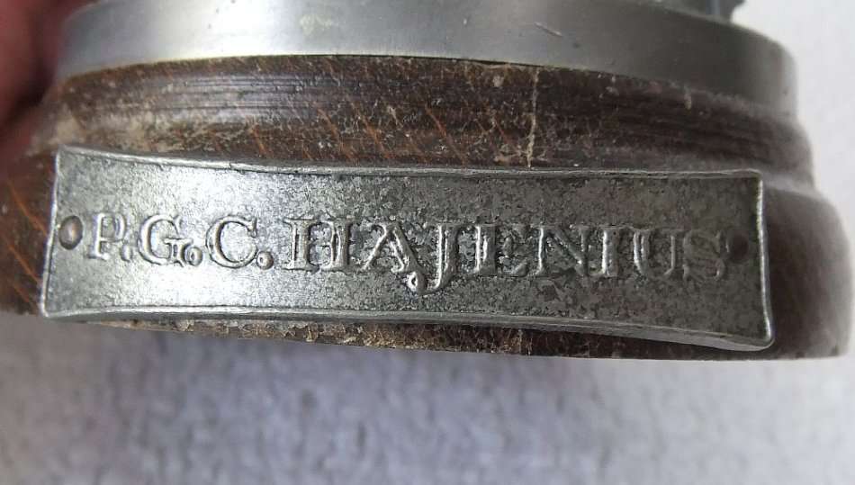 MADE FOR P.G.C HAJENIUS CIGARS OF AMSTERDAM !! A PEWTER STATUE OF A CIGAR ROLLER !! STAMPED !! WOW !