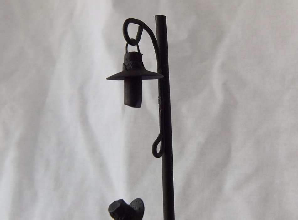 AN AWESOME VINTAGE METAL AND "ROCK" STATUE OF A MUSICIAN UNDER A LAMP POST !! MADE IN ARGENTINA !!