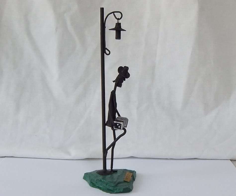 AN AWESOME VINTAGE METAL AND "ROCK" STATUE OF A MUSICIAN UNDER A LAMP POST !! MADE IN ARGENTINA !!