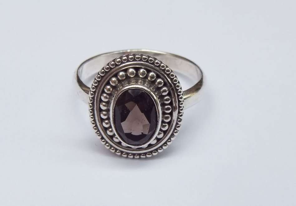 A STYLISH SOLID STERLING SILVER RING SET WITH A TOPAZ COLORED STONE !! FULLY STAMPED AND TESTED !!