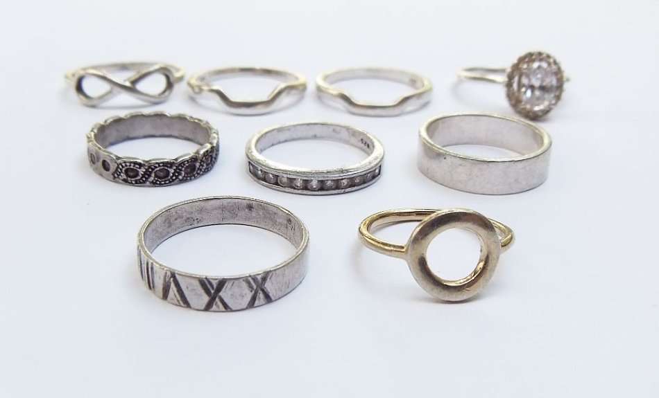 OH BOY !! WHAT A TREAT !! NINE SOLID STERLING SILVER RINGS FOR YOUR COLLECTION !! BID FOR THE LOT !!